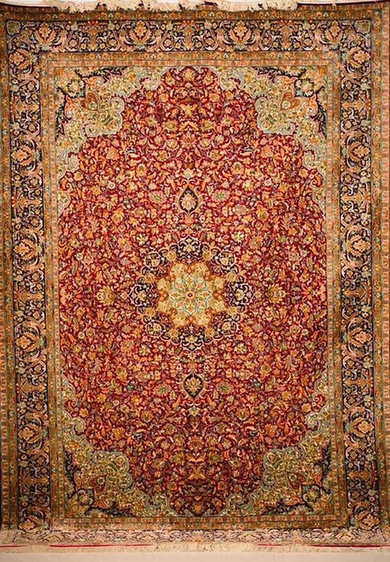 What determines the price of a Kashmiri silk carpet?